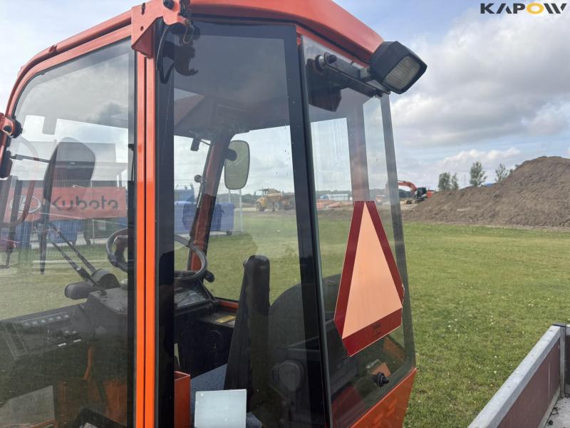 Holder C 2.34 with sweeper and salt spreader 76