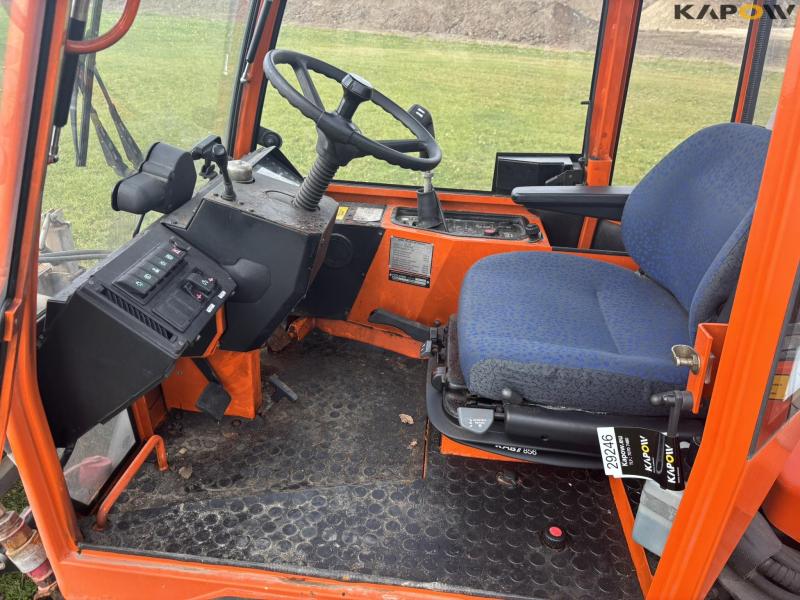 Holder C 2.34 with sweeper and salt spreader 86