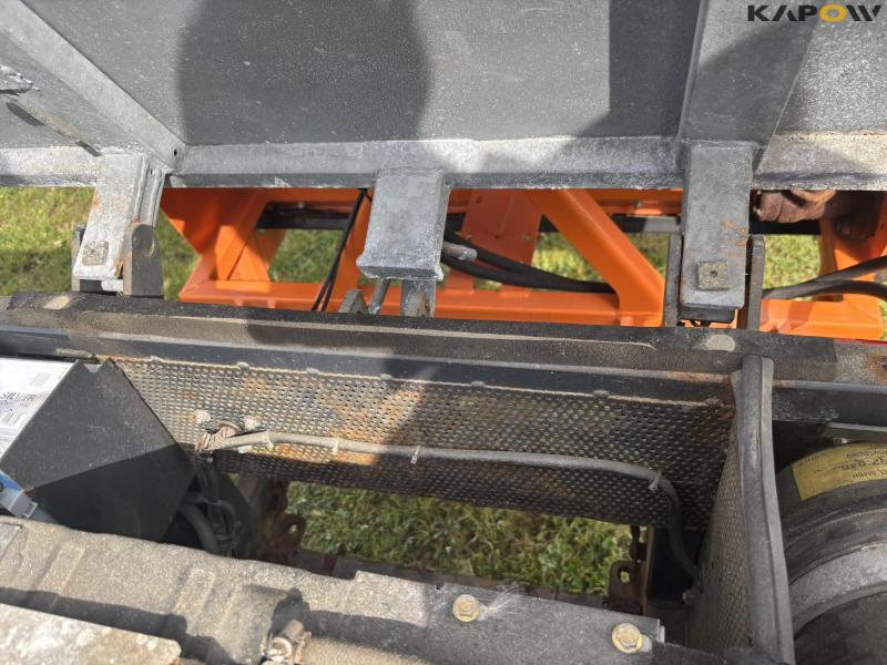 Holder C 2.34 with sweeper and salt spreader 99