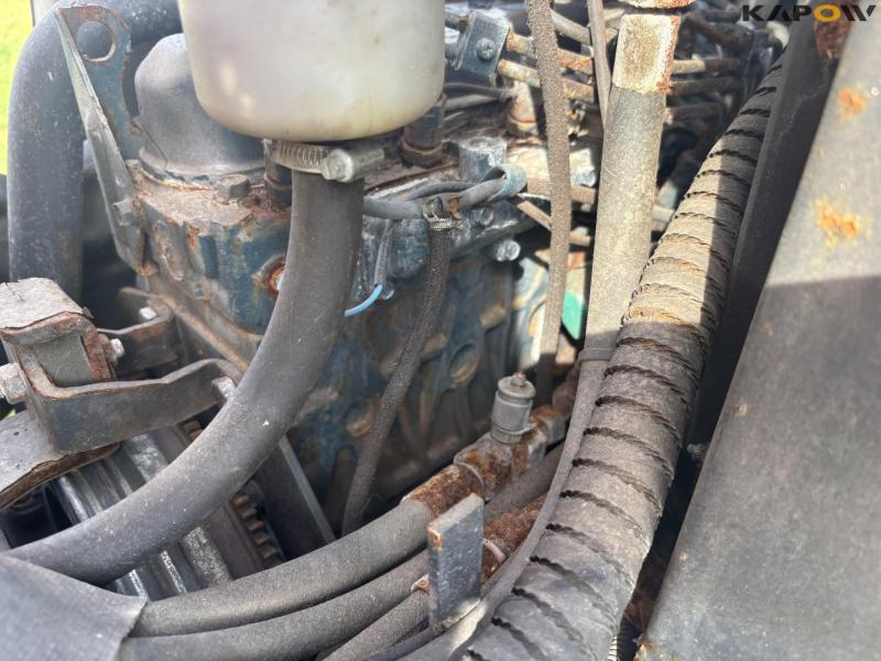 Holder C 2.34 with sweeper and salt spreader 105