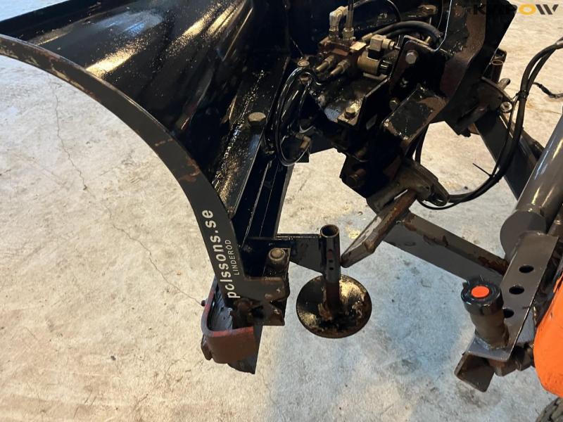 Holder C 2.42 tool carrier with snow plow and salt spreader 11