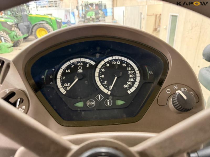 John Deere 6215R tractor 47