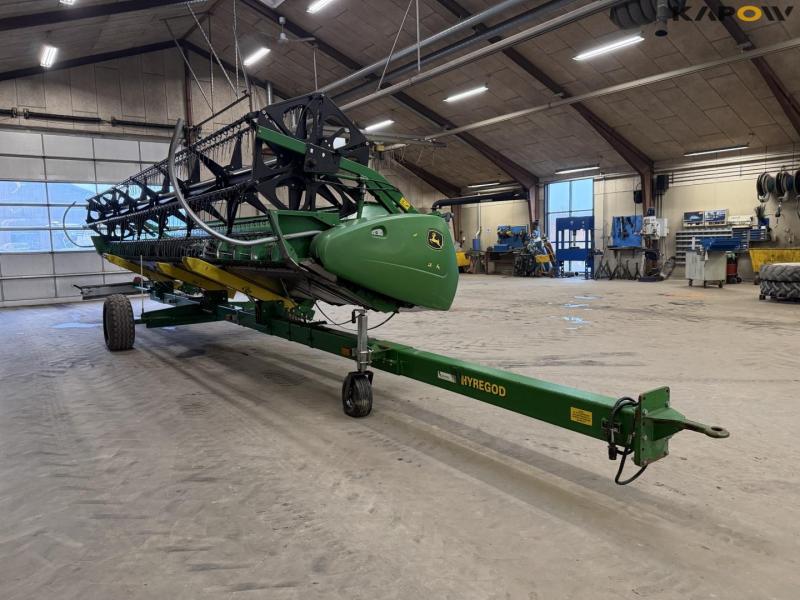 John Deere T660i with 30 foot header 65