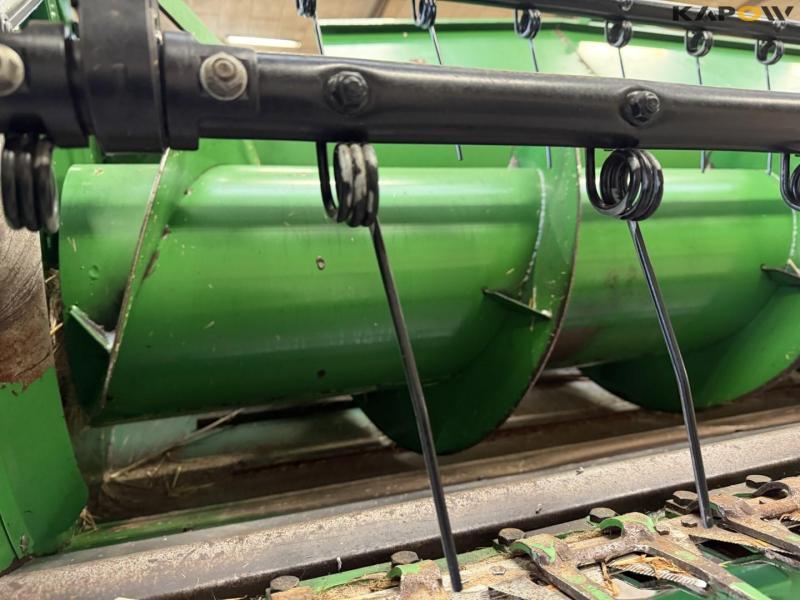 John Deere T660i with 30 foot header 79