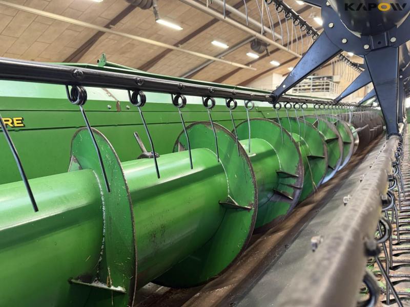 John Deere T660i with 30 foot header 80