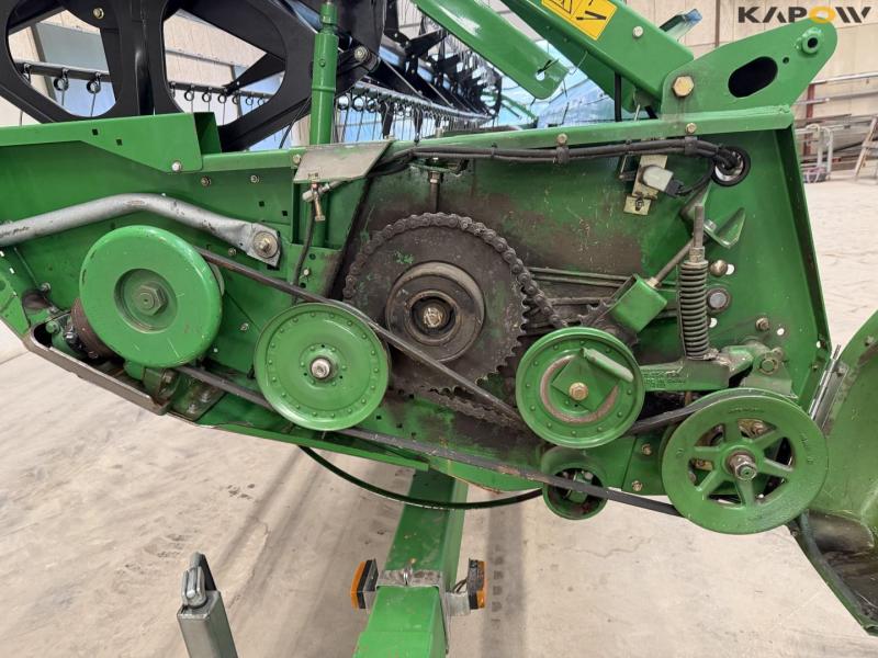 John Deere T660i with 30 foot header 91