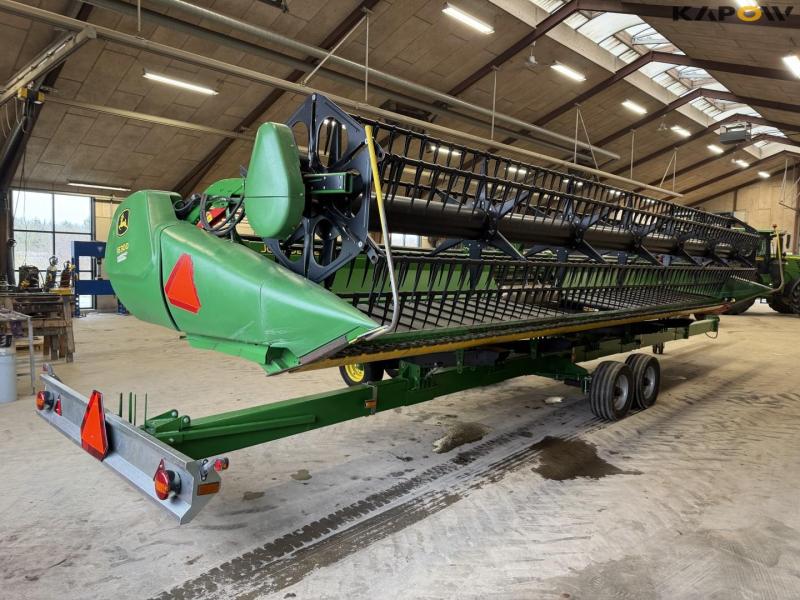 John Deere T660i combine with 30ft draper header 89