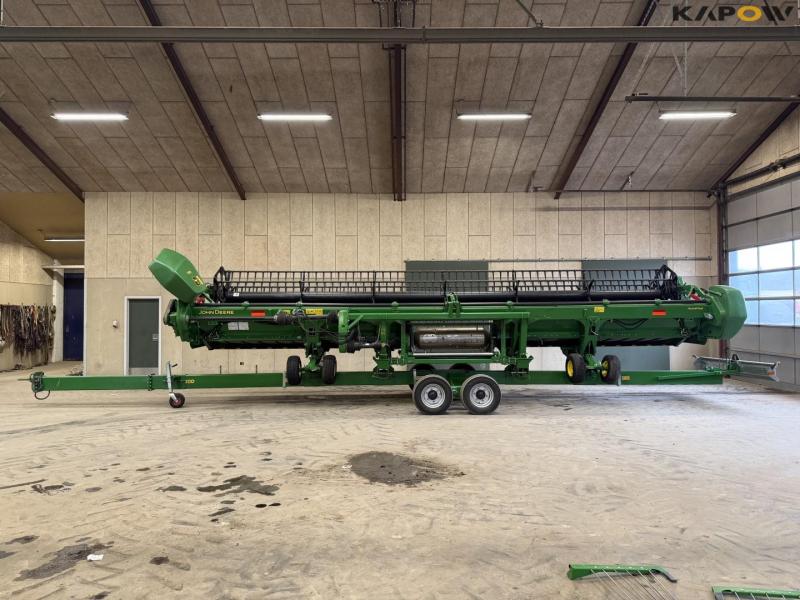 John Deere T660i combine with 30ft draper header 91