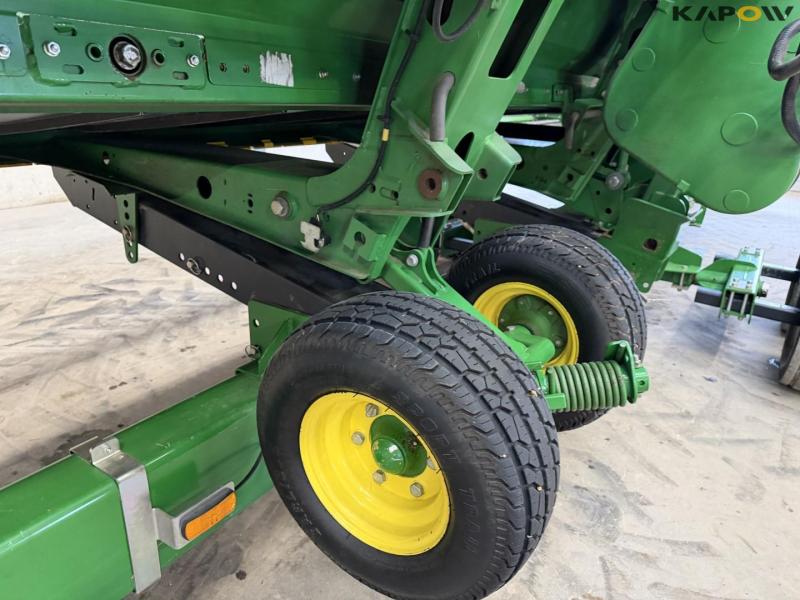 John Deere T660i combine with 30ft draper header 96