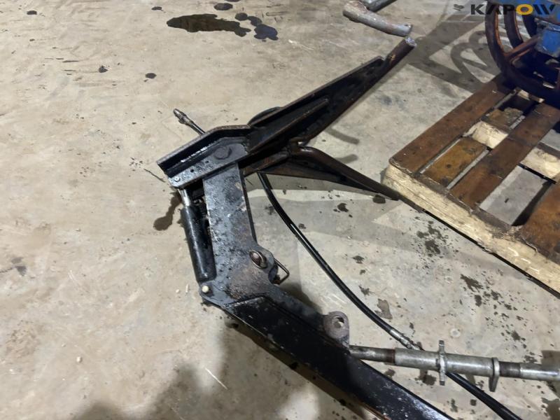 Soil packers with catch arm 7