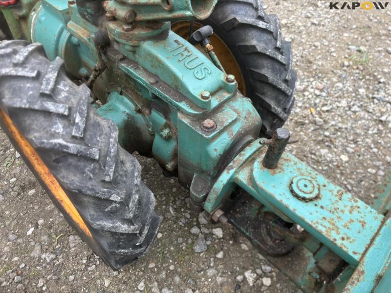 JRUS tool carrier with broom, scraper and sulky 15