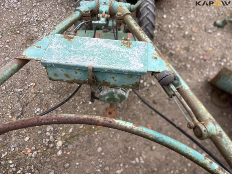 JRUS tool carrier with broom, scraper and sulky 39