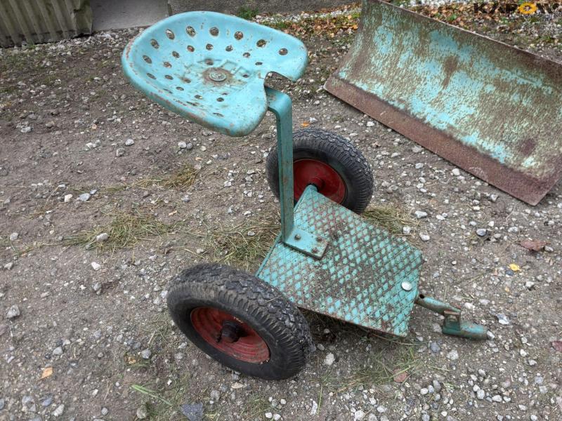 JRUS tool carrier with broom, scraper and sulky 46