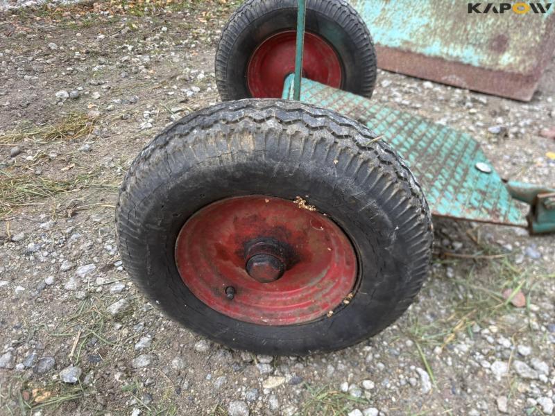 JRUS tool carrier with broom, scraper and sulky 47