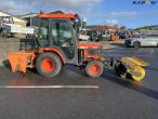 Kubota B2410 compact tractor with sweeper and salt spreader 4