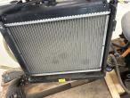 Kubota engine with cooler and hydraulic pump 29