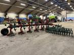 Kverneland EG100 6 furrow reversible plough with soil packers 4