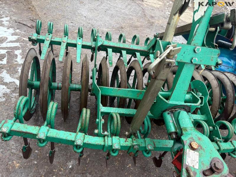 Kverneland LD 100 reversible plow with Packomat S  24