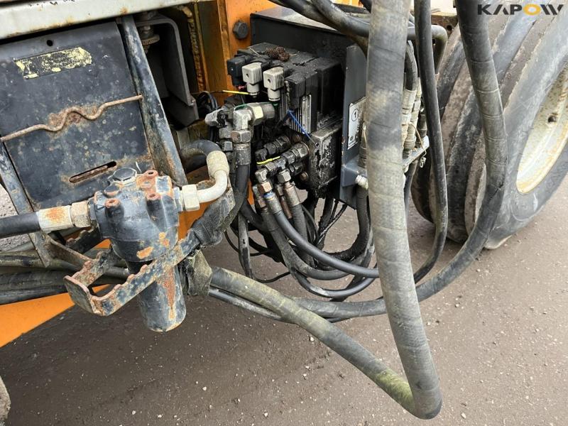 Massey Ferguson 390 tractor with arm mower 32