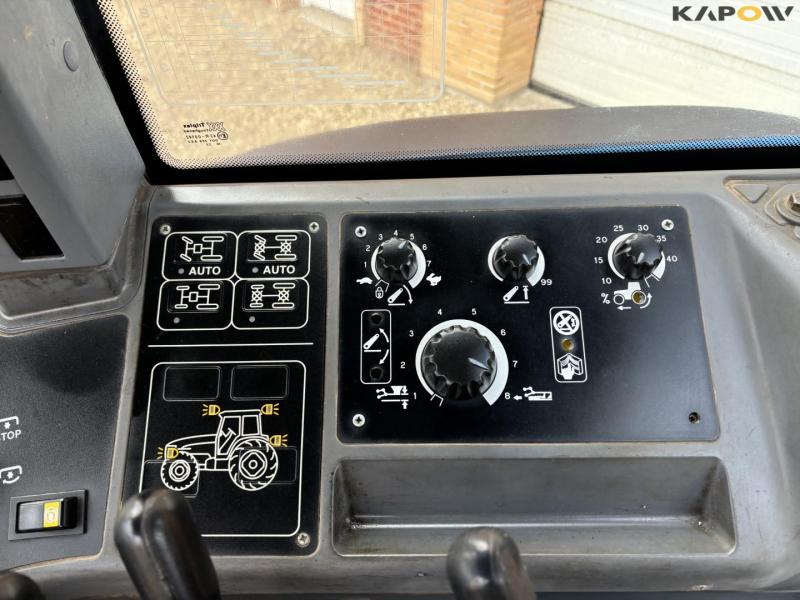 New Holland 8560 tractor with Hauer P-O-M S150 front loader 59