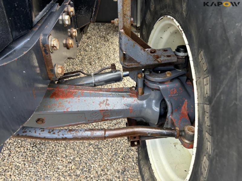 New Holland 8560 tractor with Hauer P-O-M S150 front loader 81