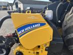 New Holland FR550 with corn header and pickup 83