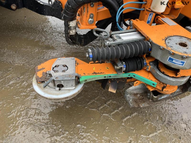 New Holland T6.150 tractor with Mulac arm mower 57