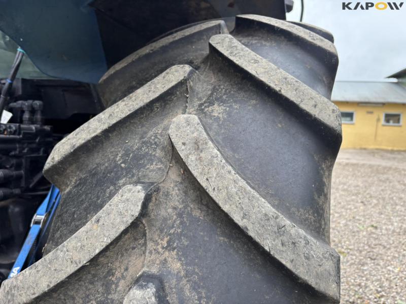 New Holland TS 115 with Bomford arm mower 25