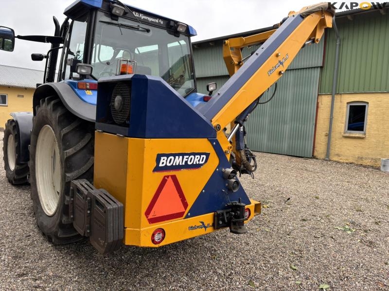 New Holland TS 115 with Bomford arm mower 54