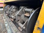 New Holland TS 115 with Bomford arm mower 103