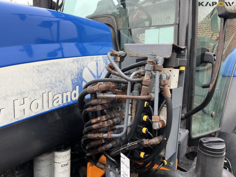 New Holland TS135A tractor with Epoke arm mower 11