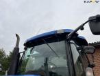 New Holland TS135A tractor with Epoke arm mower 12