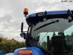 New Holland TS135A tractor with Epoke arm mower 25