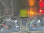 New Holland TS135A tractor with Epoke arm mower 35