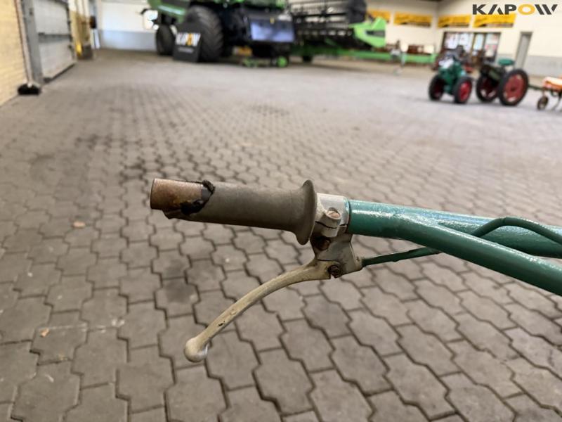 Tool carrier with cylinder mower 26