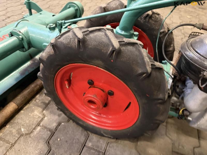 Tool carrier with cylinder mower 30