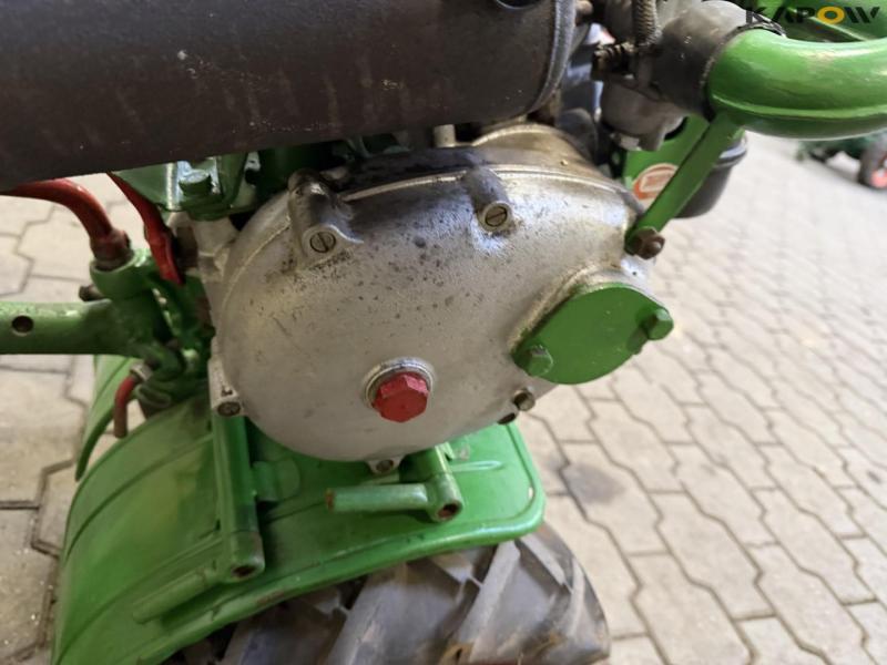 Tool carrier with plow 12