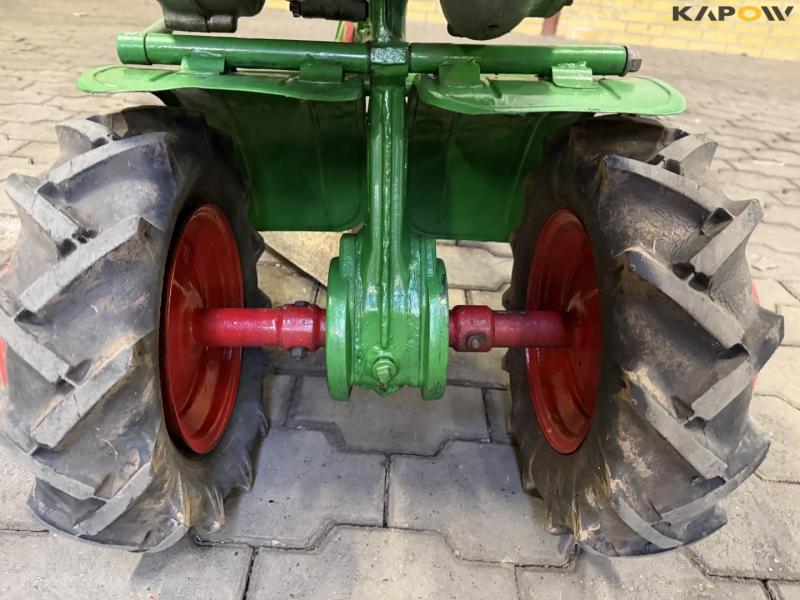 Tool carrier with plow 23