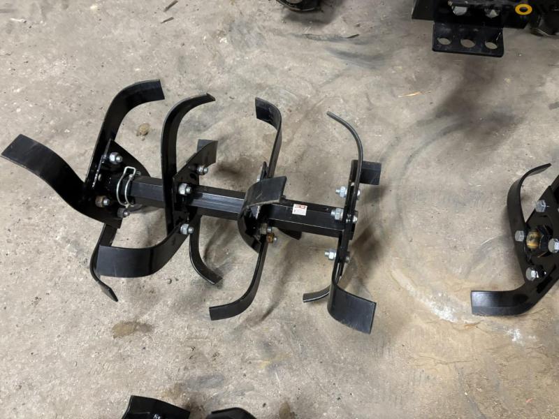 Tool carrier with tiller 46