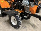 Tool carrier with tiller 15