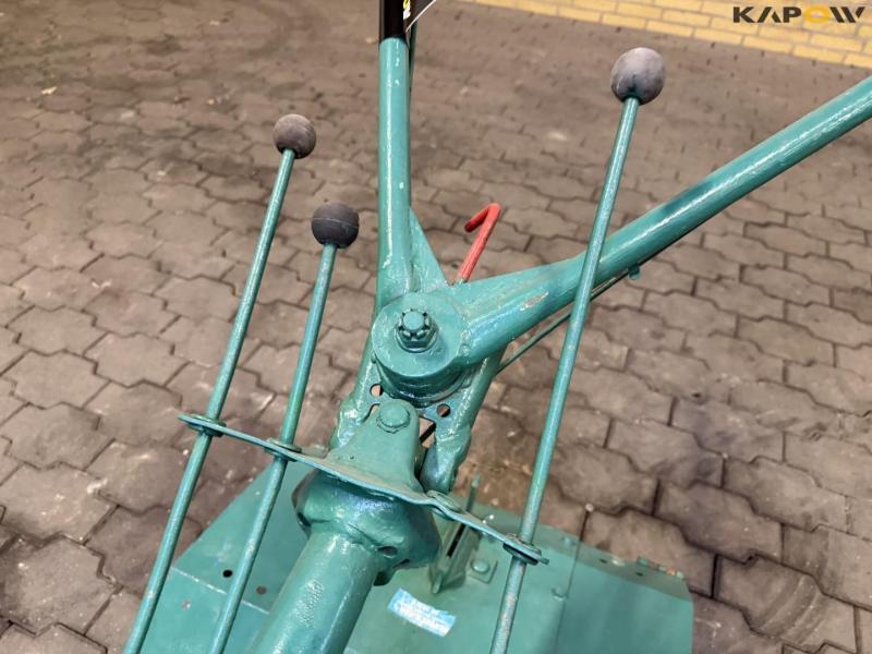 Tool carrier with milling cutter 23