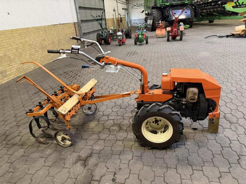 Tool carrier with harrow 4