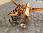 Tool carrier with harrow 37