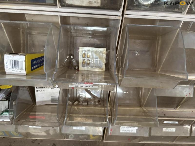 Assortment shelf with contents 15