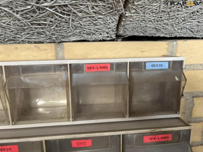 Assortment shelf with contents 21