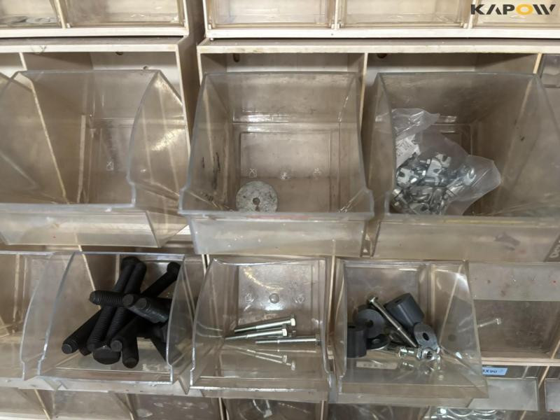 Assortment shelf with contents 23