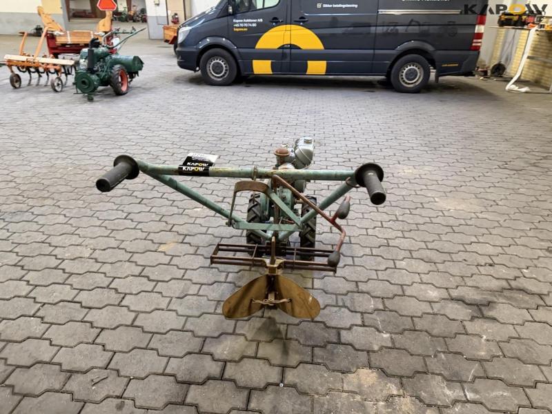 The Farmers Boy tool carrier with plow 6