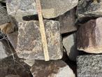 Clear the space of stones and tiles 97