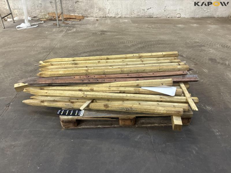 Pressure-treated wooden posts 8
