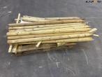 Pressure-treated wooden posts 12